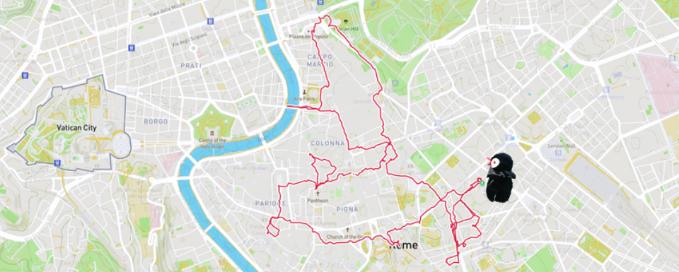 Rome map showing a red route line and the penguin mascot Miško