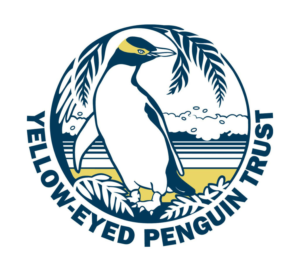 Logo of the Yellow-Eyed Penguin Trust featuring a penguin on a beach