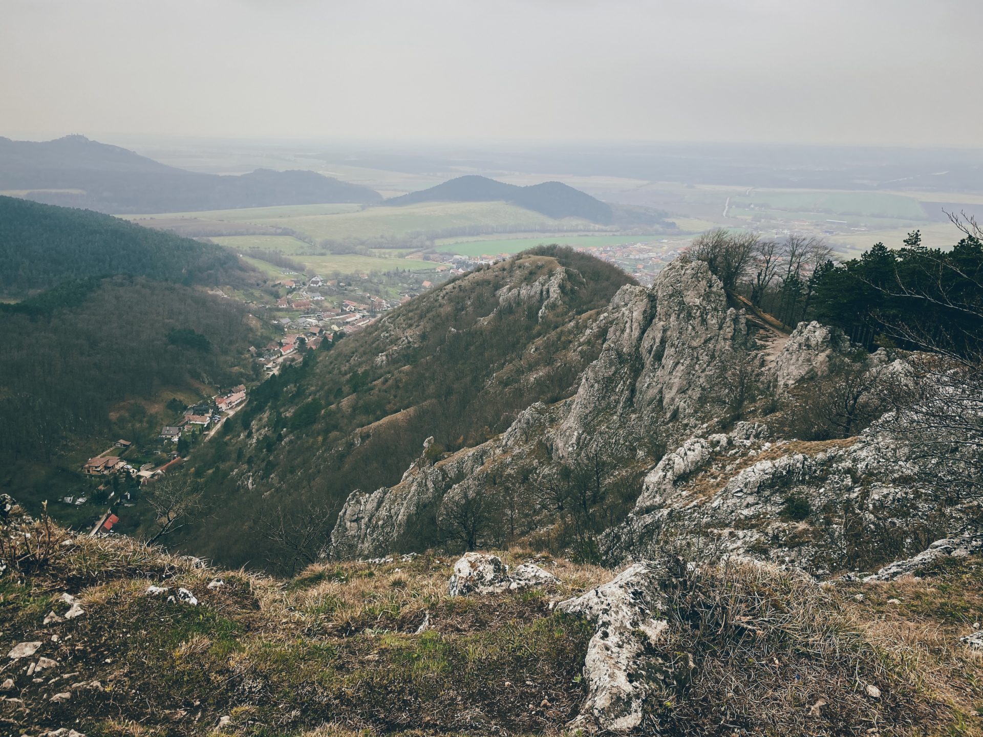 View of a valley and village from the rocky trails of Plavecký Mikuláš