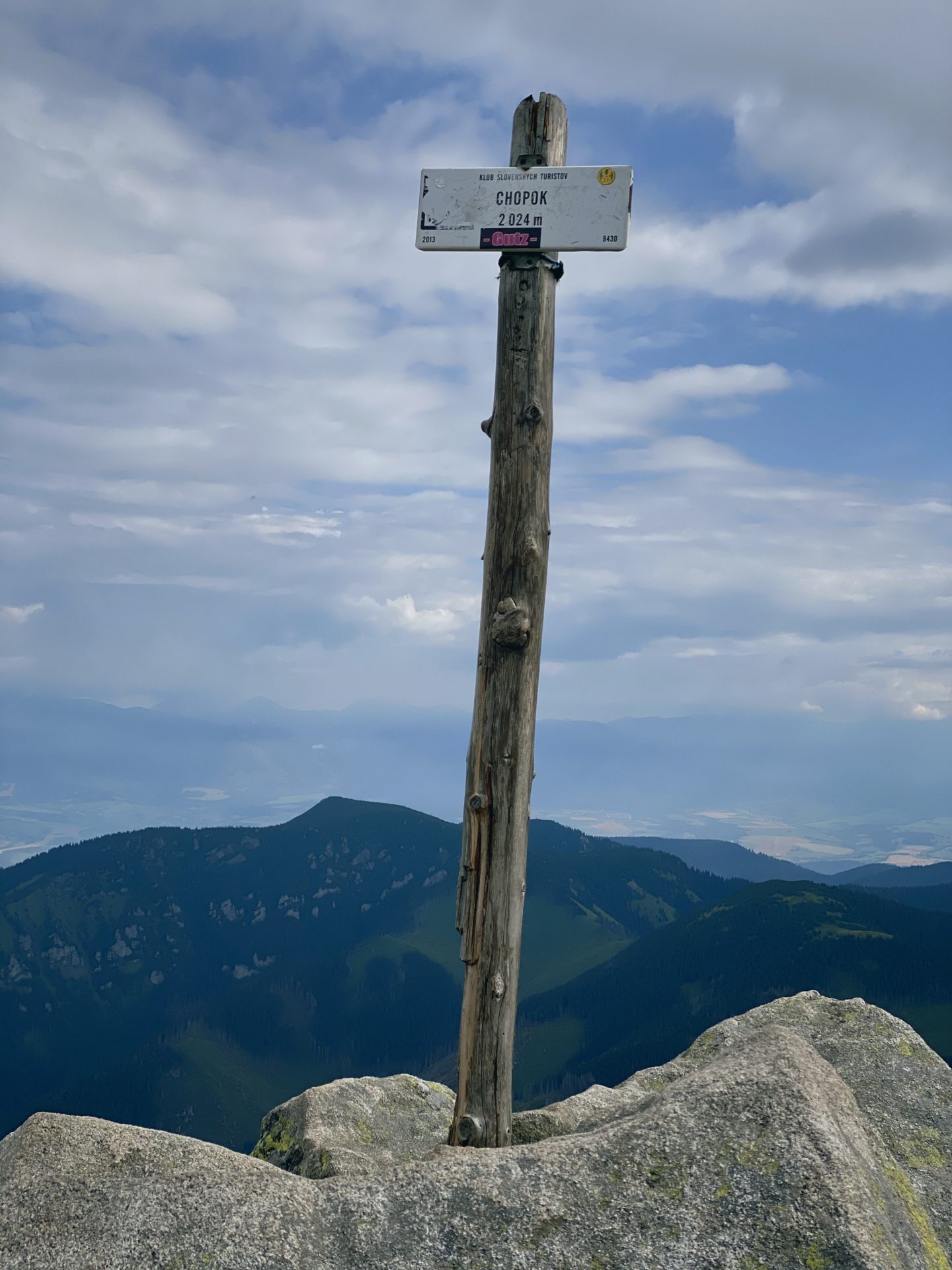 Wooden signpost marking the summit of Chopok in the Low Tatras mountains