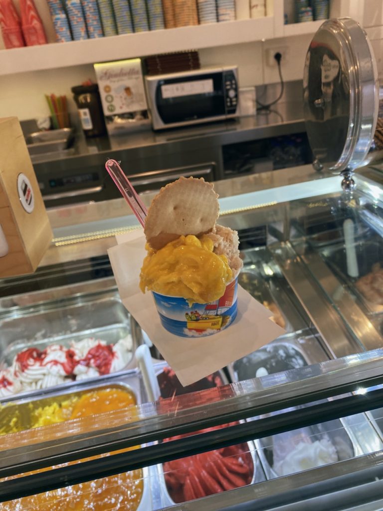 Cup of gelato with a wafer topping in an Alghero ice cream shop