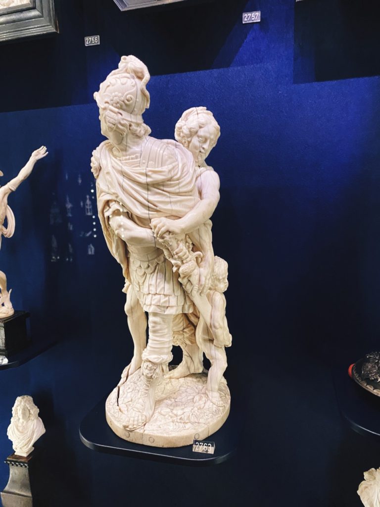 Intricate ivory sculpture of figures on display at Rosenborg Castle