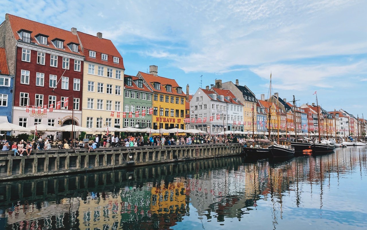 Colourful houses and boats along Nyhavn in Copenhagen