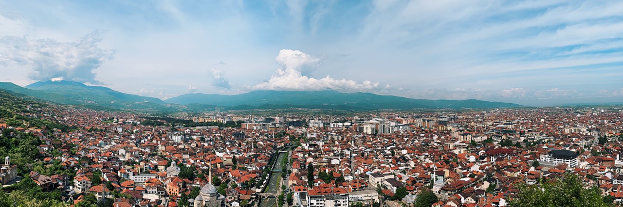 Panoramic view of the city of Prizren with red-roofed houses from Prizren Fortress