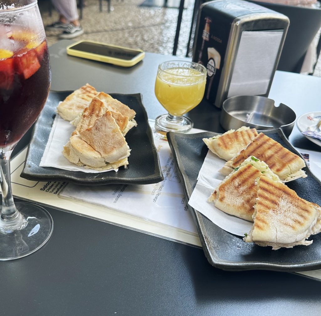 Toasted sandwiches served with sangria and juice at a cafe in Madeira