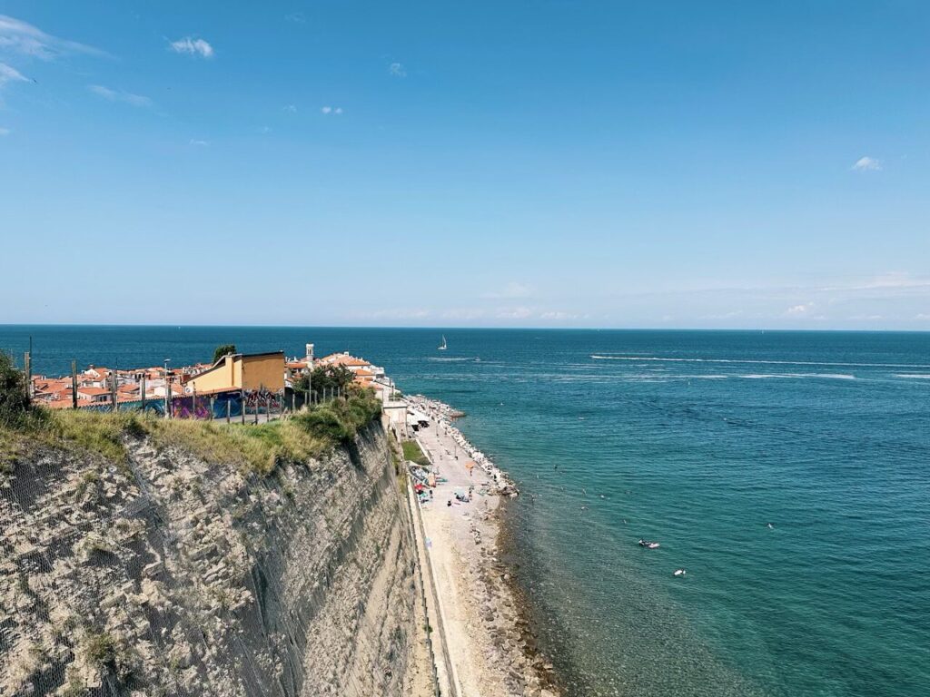 High cliffs overlook the Adriatic Sea and the coastal town of Piran
