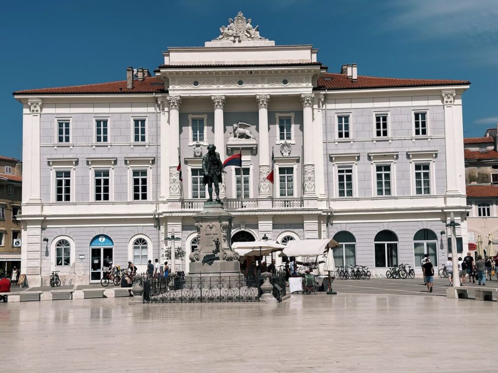 The grand Town Hall and Tartini monument in Tartini Square, Piran